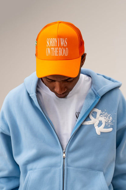 “Sorry I Was On The Road” Orange Trucker Hat